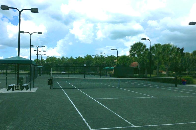 A tennis court on a cloudy day in Pelican Preserve of Fort Myers, Florida