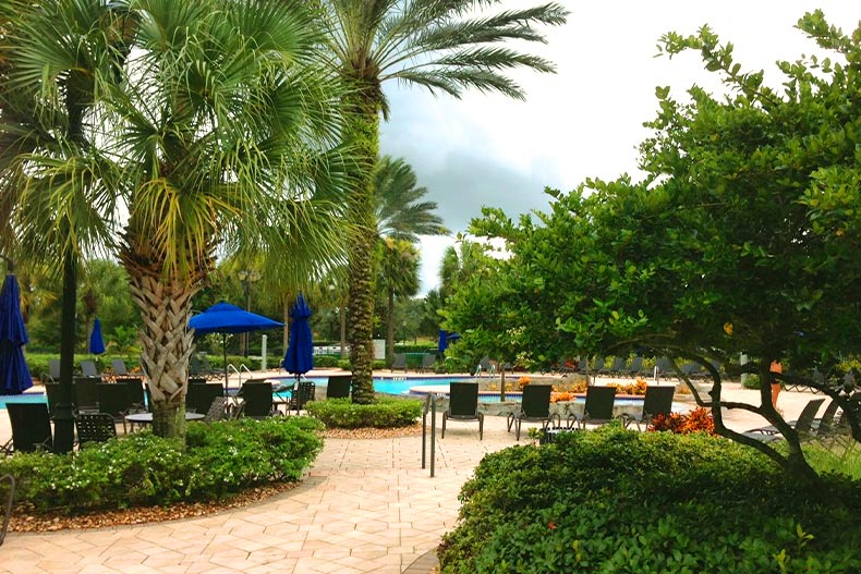 View of the outdoor pool and patio at Pelican Preserve in Fort Myers, Florida