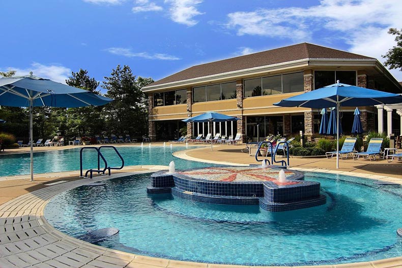The outdoor pool and patio at Sun City Huntley in Huntley, Illinois
