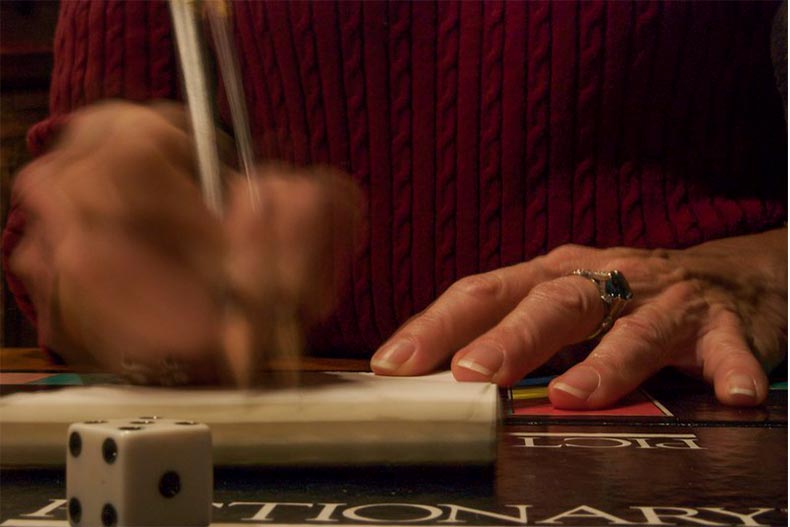 Close up of person drawing in Pictionary