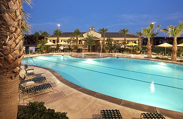 Outdoors at Solera Kern Canyon, residents can go for a swim in the heated pool or relax in the spa.