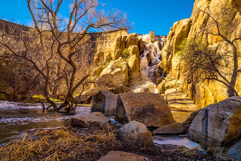 Water from the Watson Lake Dam overflowing down a mountain side in Granite Dells of Prescott, Arizona