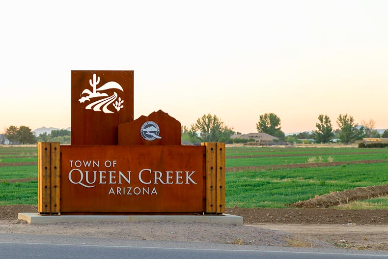 "Town of Queen Creek" sign located near an intersection in Queen Creek, Arizona