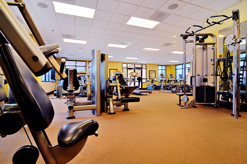 Carpeted fitness center with equipment in Sonora at Rancho Sahuarita, Arizona