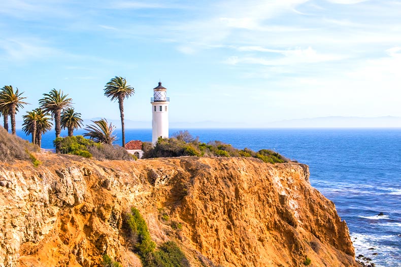A lighthouse on a cliff overlooking the Pacific Ocean in Redondo Beach, California