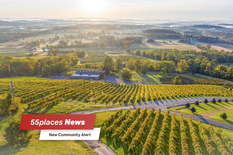 Aerial shot of Bluemont Vineyards, located in Loudoun County, VA with 55places News banner overlay and new community alert text below.