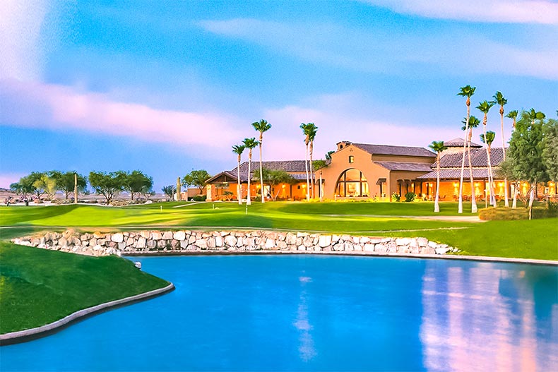 View across the pond of the clubhouse at Robson Ranch - Arizona in Eloy, Arizona