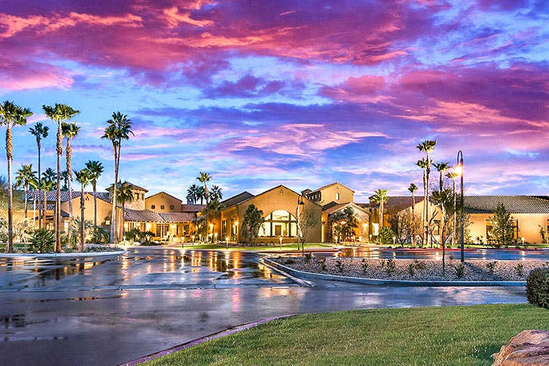 Exterior view of the clubhouse at Robson Ranch in Eloy, Arizona at sunset