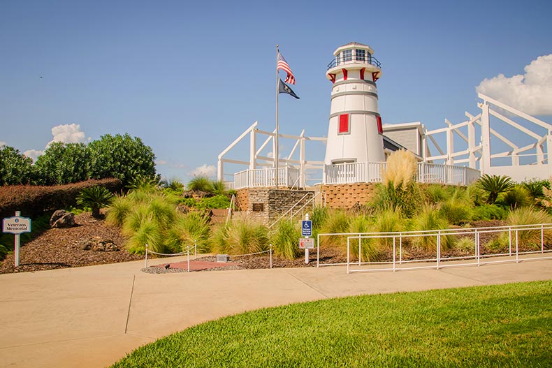 View of the lighthouse on the grounds of Royal Harbor in Tavares, Florida