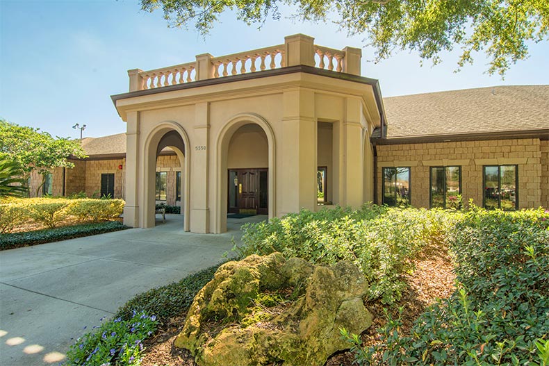 Exterior view of the clubhouse at Royal Highlands in Leesburg, Florida