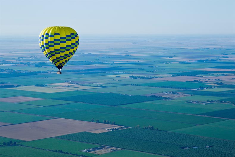A hot air balloon above the Sacramento Valley in California