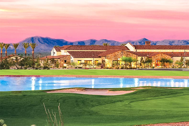 View across a pond of the La Hacienda Club in SaddleBrooke Ranch in Oracle, Arizona