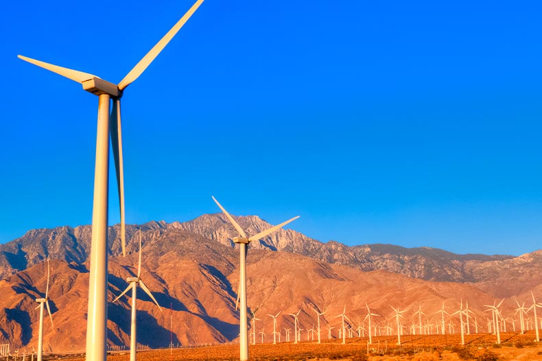 View of wind turbines in front of the San Jacinto Mountains in California