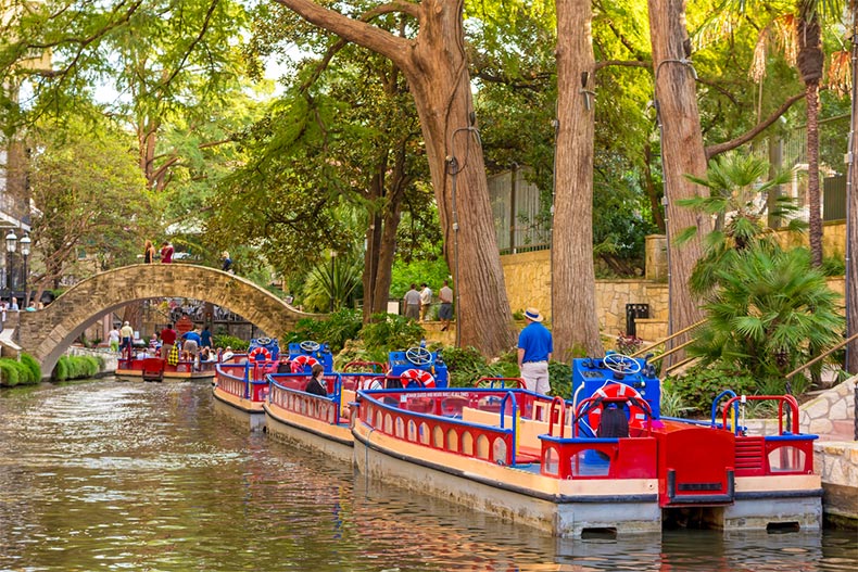 Boats in the river running through San Antonio, Texas