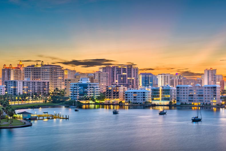 View of the downtown skyline on the bay in Sarasota, Florida at sunset