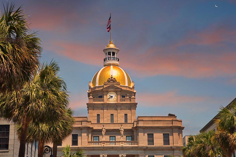 Sunset view of the famous gold domed city hall in Savannah, Georgia