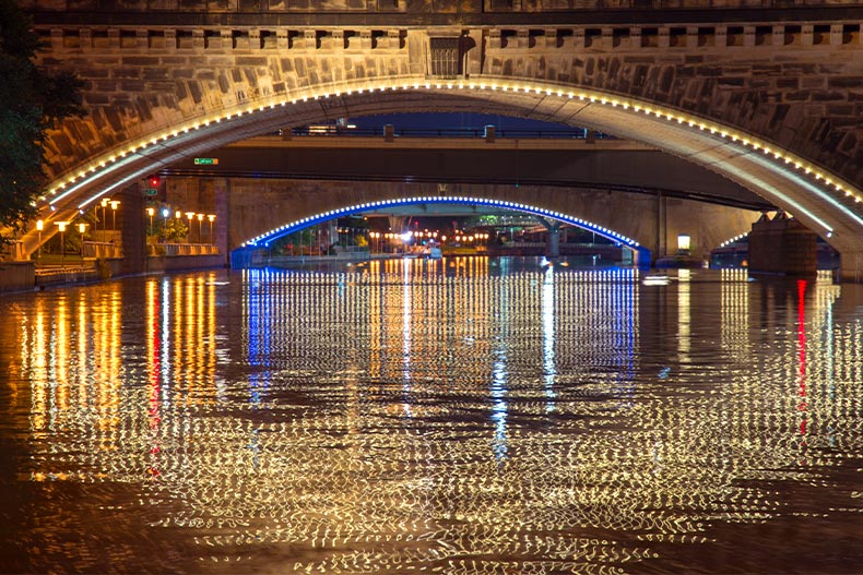 Night view of the Schuylkill River running under the Market Bridge in Philadelphia, Pennsylvania