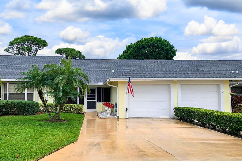 Exterior view of an attached home at Sea Pines in Hobe Sound, Florida