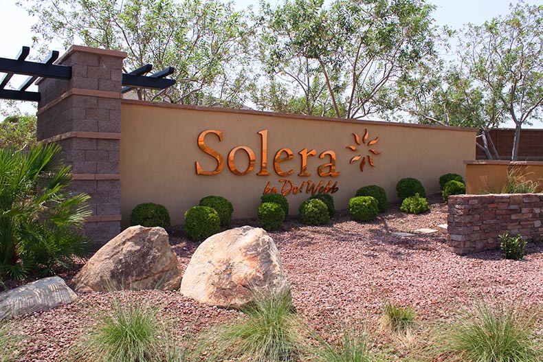 Greenery surrounding the community sign for Solera at Anthem in Henderson, Nevada
