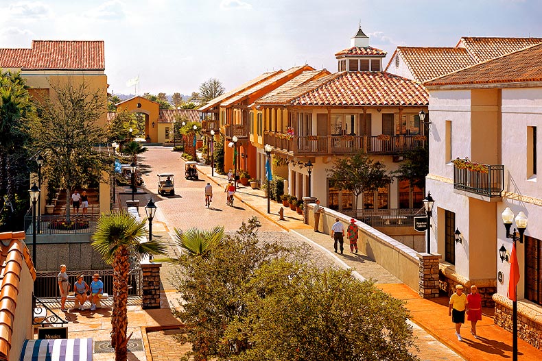 Aerial view of the Village Center in Solivita with residents strolling by shops, located in Kissimmee, Florida