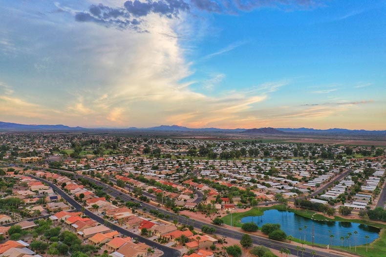 Aerial view of houses and a pond in Sun City, Arizona