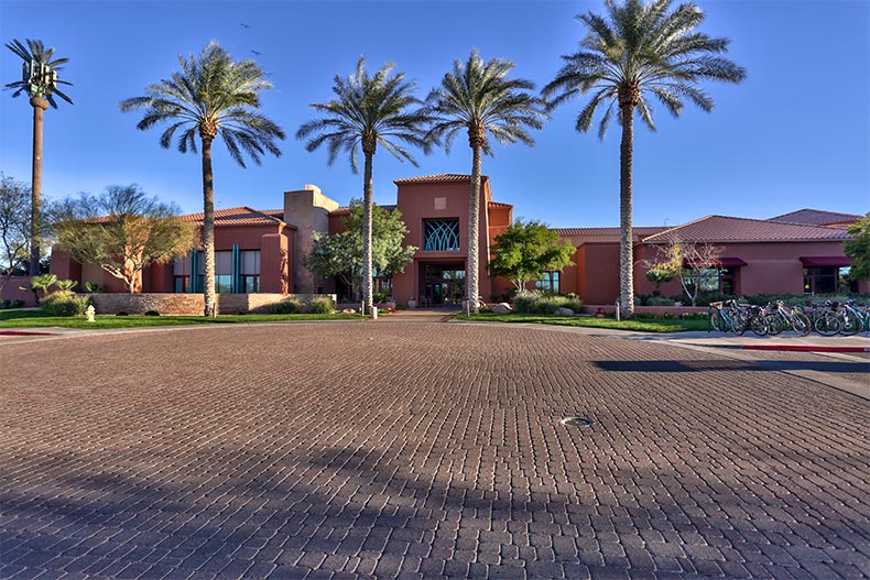 Palm trees outside a community building at Sun City Grand in Surprise, Arizona