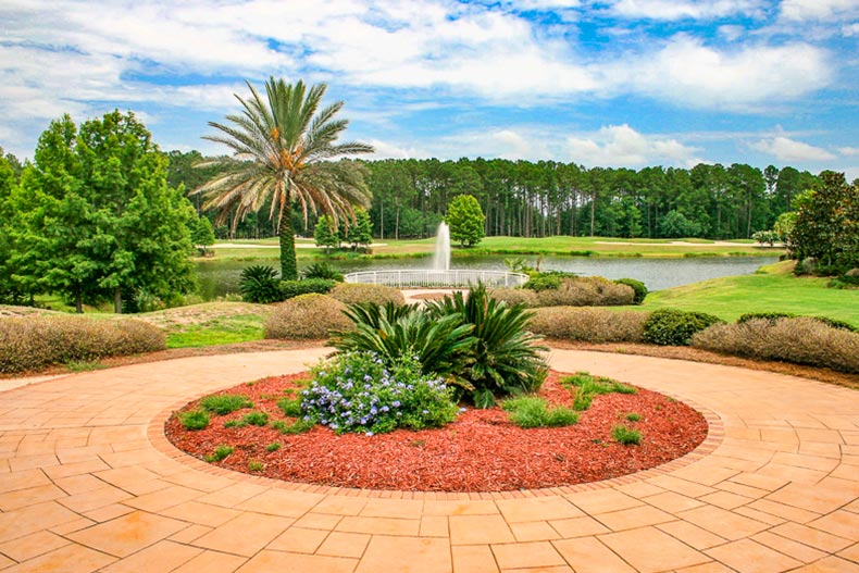 Landscaped greenery and a fountain at Sun City Hilton Head in Bluffton, South Carolina