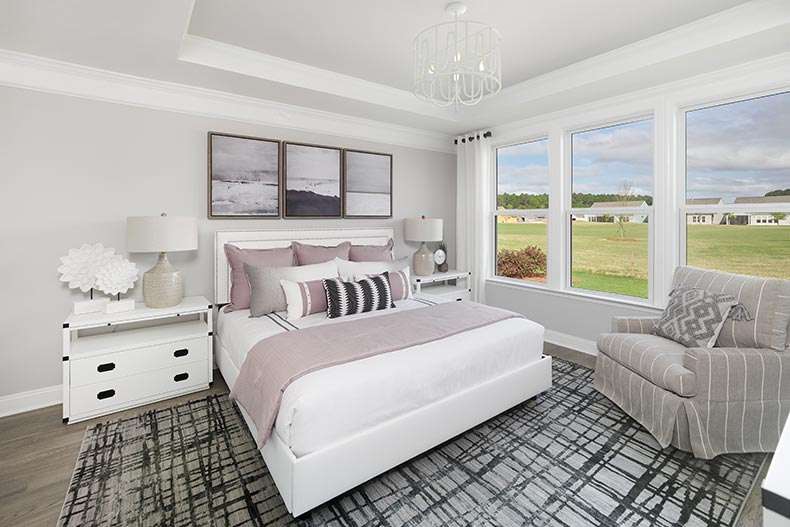 Interior view of a bedroom in a model home at Sun City Hilton Head in Bluffton, South Carolina