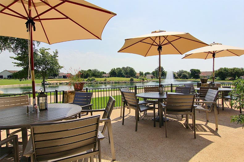 Tables and chairs on an outdoor patio in Sun City Texas in Georgetown, Texas