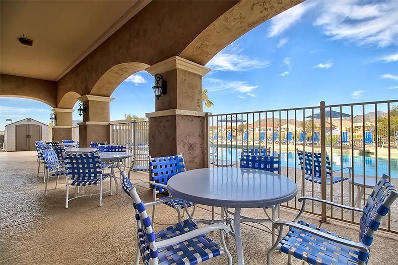 Chair surrounding tables on the outdoor patio at Sundance in Buckeye, Arizona