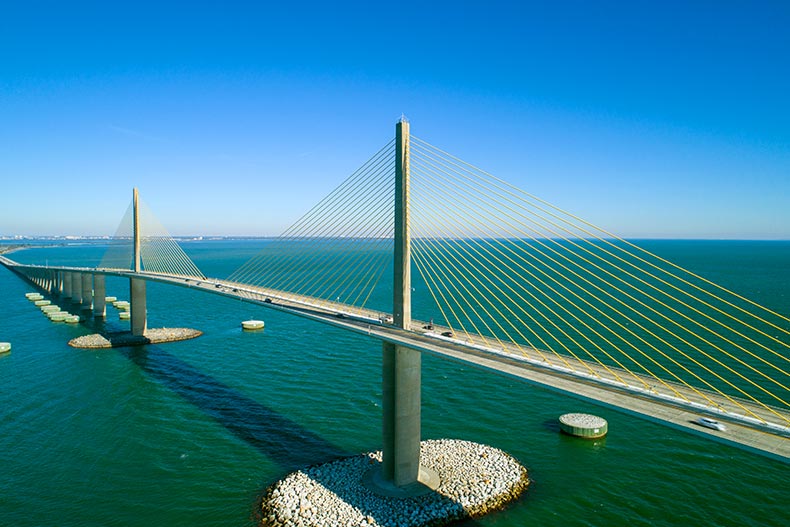 A steel suspension bridge running over Tampa Bay in Tampa, Florida