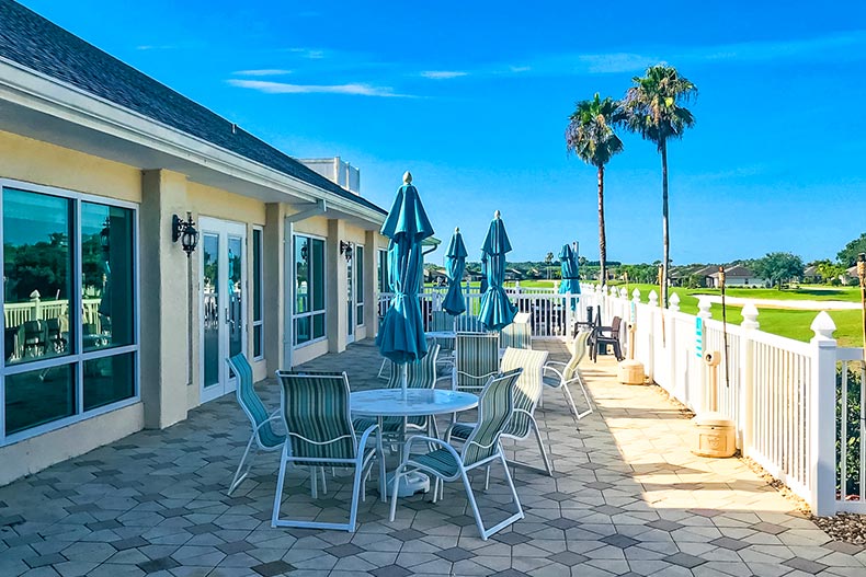 Table and chairs on a patio at Tampa Bay Golf and Country Club in San Antonio, Florida