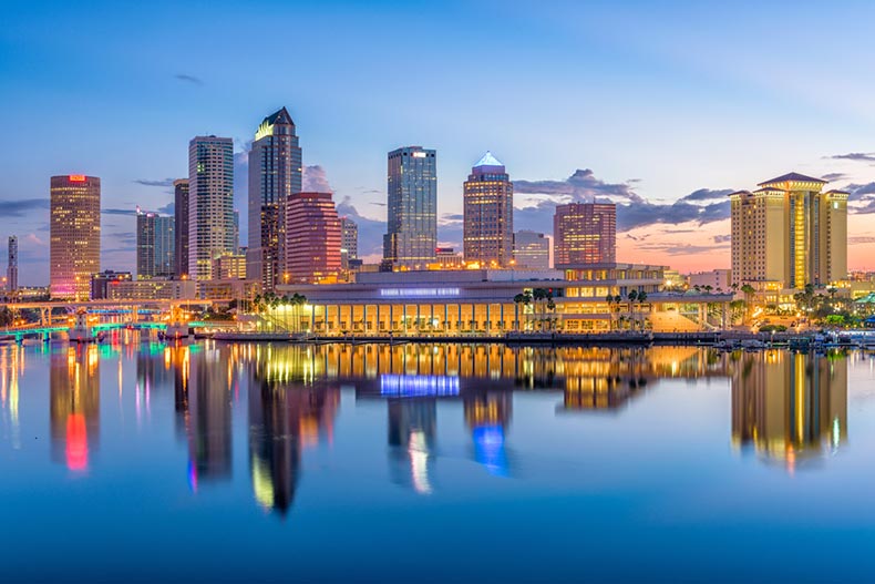 View across the water of the skyline of Tampa, Florida at sunset
