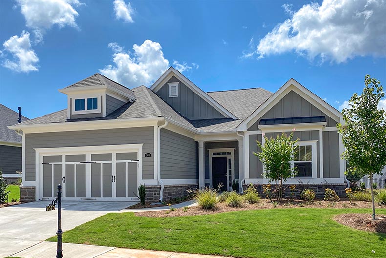 Exterior view of a model home at The Orchards of Central Park in Cumming, Georgia