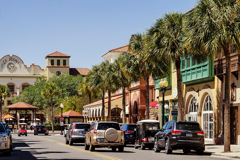 Palm trees and shops lining the street in The Villages, Florida