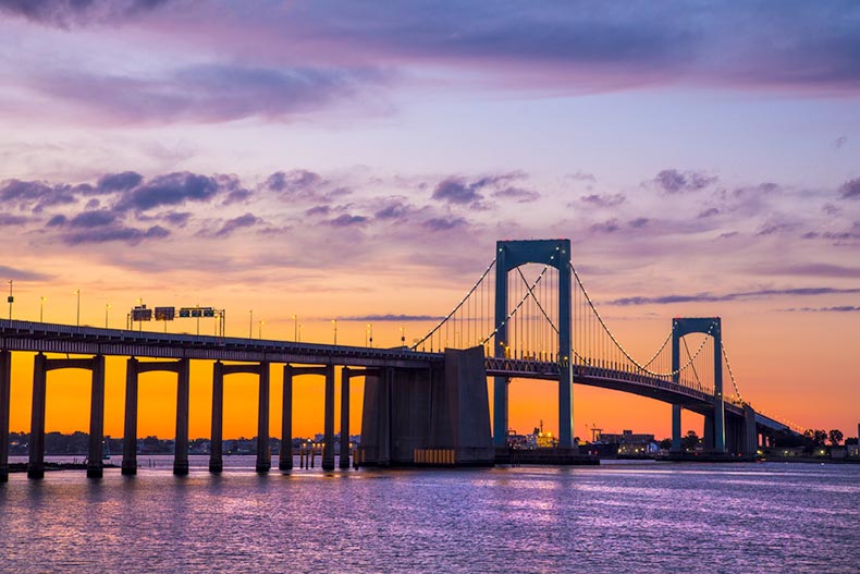 A colorful sunset over Long Island Sound and Throgs Neck Bridge in New York City