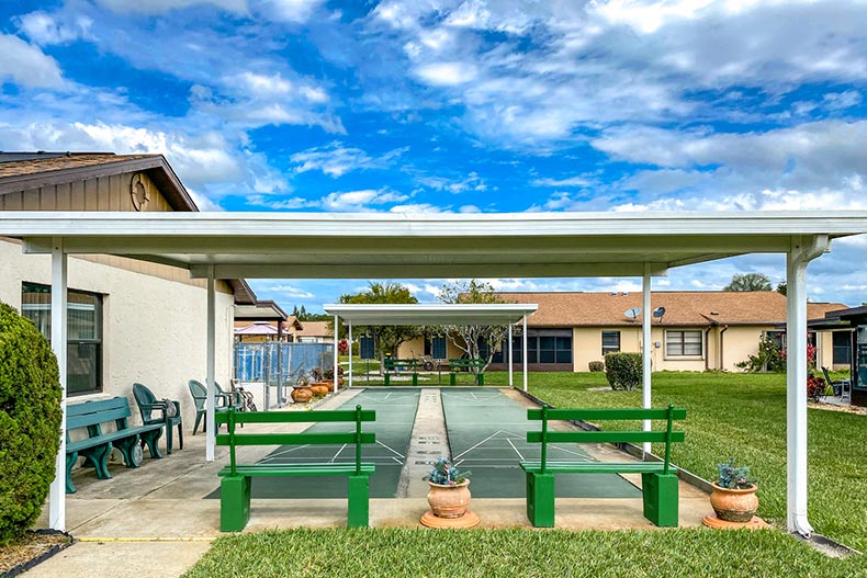 Benches beside the shuffleboard courts at Thunderbird Hill in Sebring, Florida