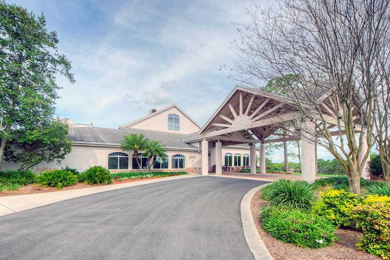 Exterior view of the entrance to the clubhouse at Timber Pines in Spring Hill, Florida
