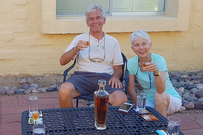 Tom Buinicky and his wife Mary Ferland enjoying tequila in their Arizona community