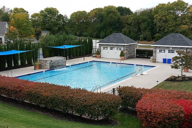 Aerial view of the outdoor pool and patio at Traditions of America at Silver Spring.