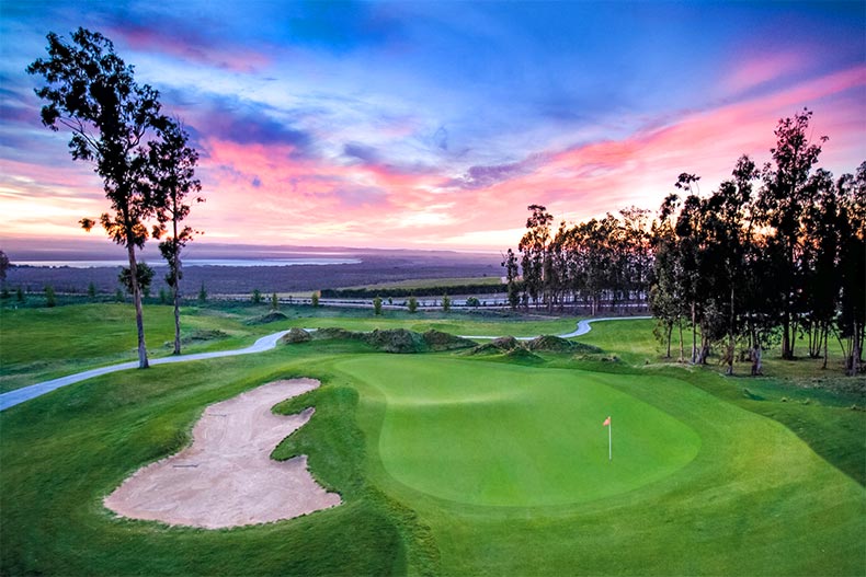 Sunset view of the golf course at Trilogy at Monarch Dunes in Nipomo, California