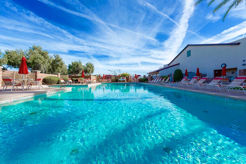 An outdoor pool and patio at Trilogy at Power Ranch in Gilbert, Arizona