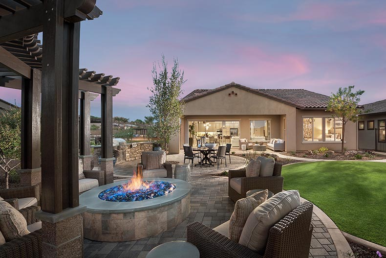 Lounge chairs surrounding an outdoor fire pit at Trilogy at Vistancia in Peoria, Arizona