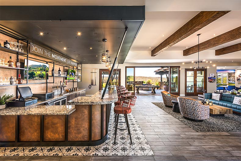 Interior view of the bar and lounge area at Trilogy at Wickenburg Ranch in Wickenburg, Arizona