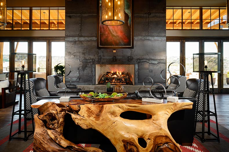 Interior view of a stylish fireplace lounge at Trilogy at Wickenburg Ranch in Wickenburg, Arizona