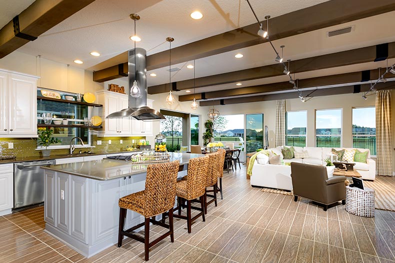 A kitchen and living room at Trilogy Orlando in Groveland, Florida