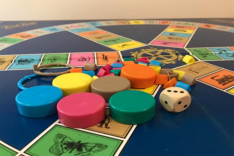 Close up of a Trivial Pursuit board and pieces