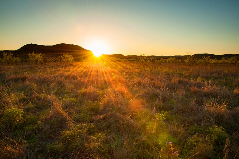 A sunset over West Texas scrubland