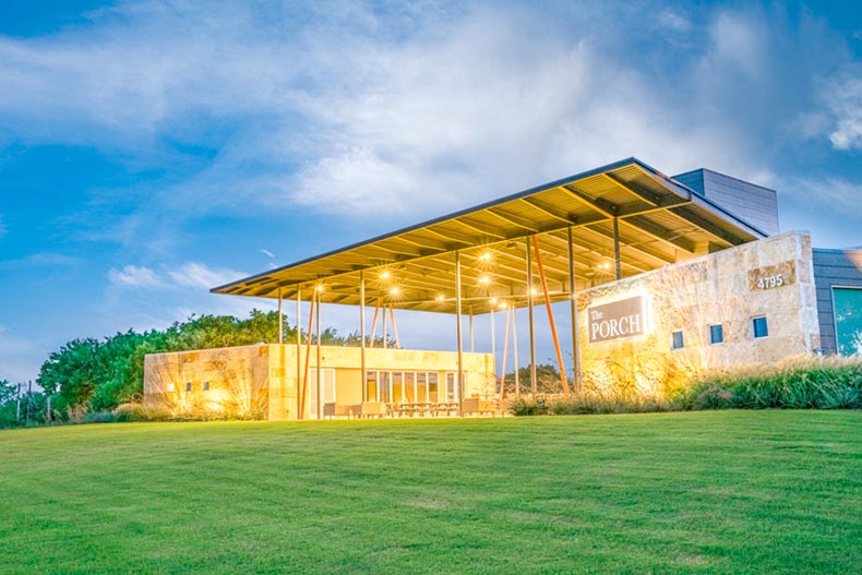 A green lawn surrounding the outdoor pavilion at Del Webb at Union Park in Little Elm, Texas