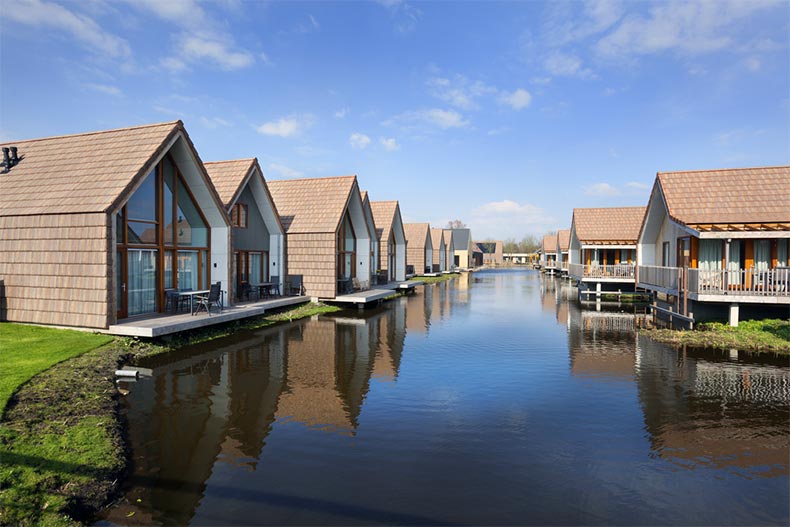 Vacation houses on a river in Reeuwijk in the Netherlands